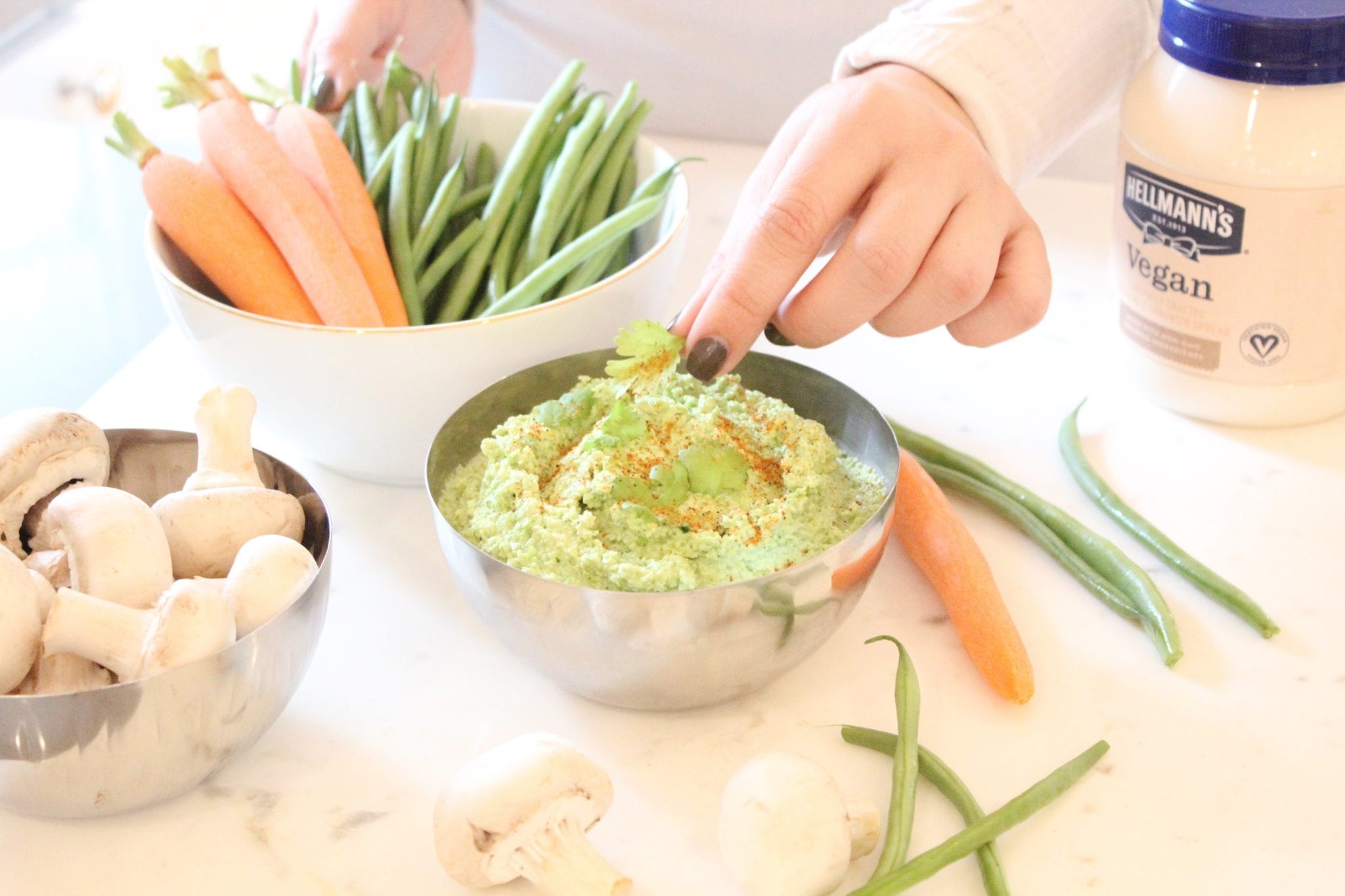 Looking for a party dip that is healthy while still being delicious? This Spicy Hummus Dip is perfect for everyone!
