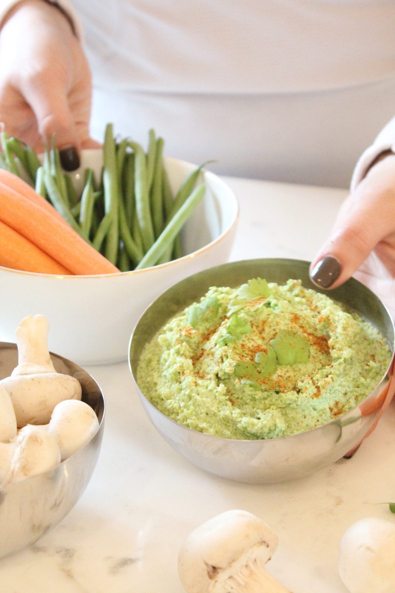 Looking for a party dip that is healthy while still being delicious? This Spicy Hummus Dip is perfect for everyone!
