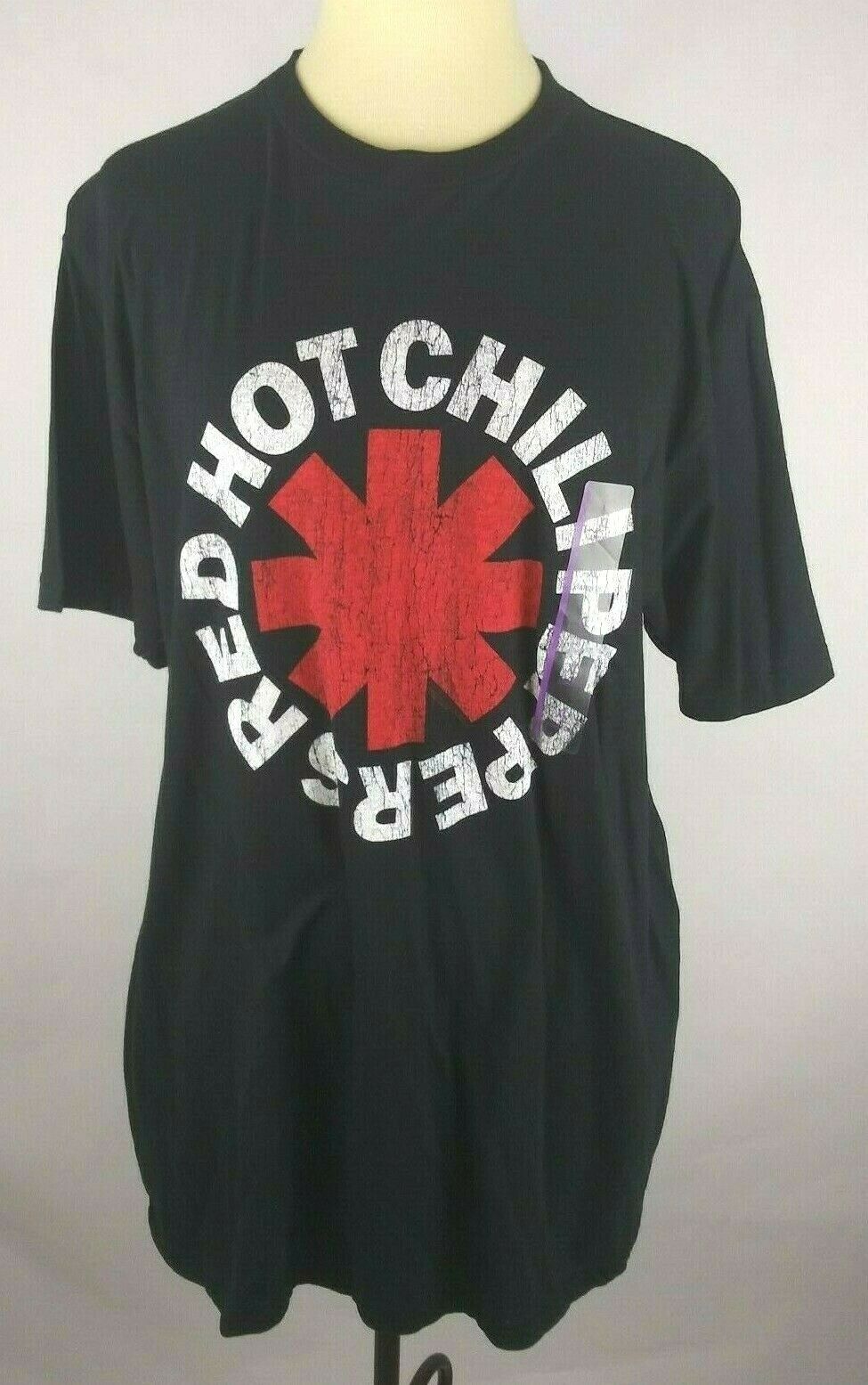 Red Hot Chili Peppers T Shirt Just Add Glam | 30 BEST VINTAGE BAND TEES by popular San Francisco life and style blog, Just Add Glam: image of a vintage Red Hot Chili Peppers tee. 