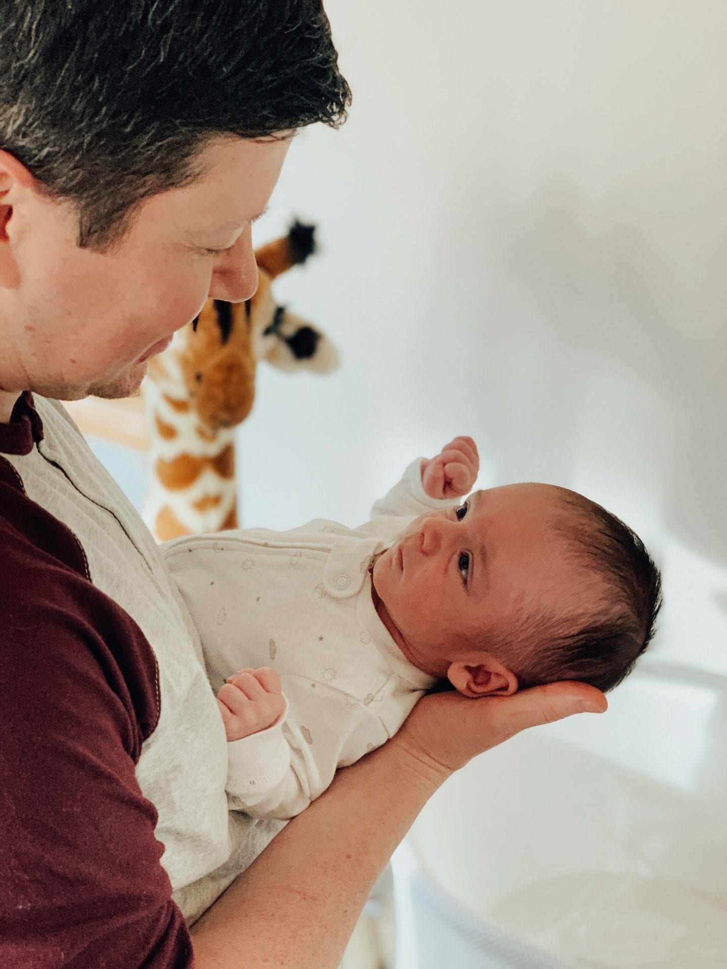 Baby Snoo Bassinet Review by popular San Francisco life and style blog, Just Add Glam: image of a dad holding his baby boy. 