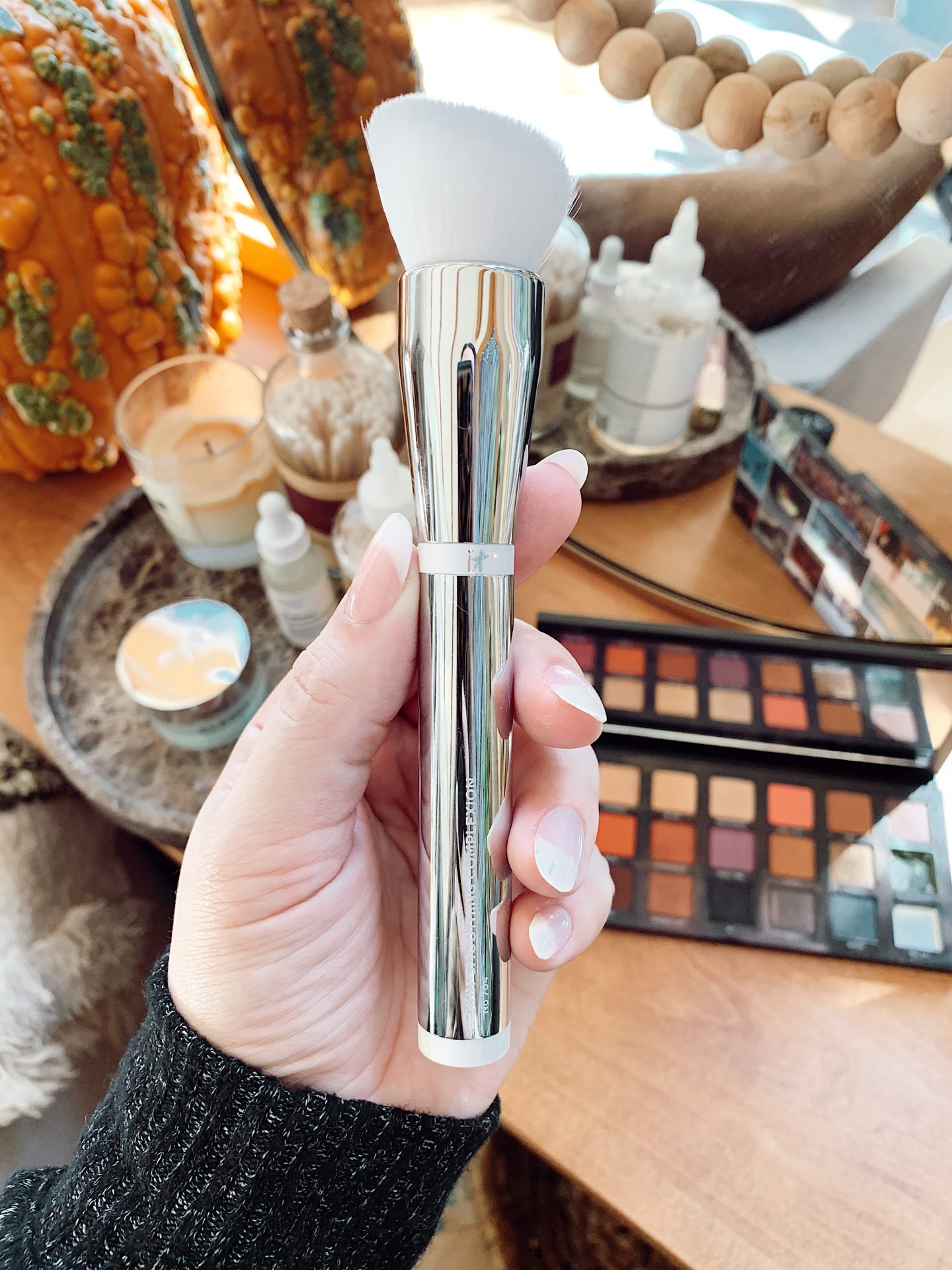 it cosmetics brush |Fall Beauty by popular San Francisco beauty blog, Just Add Glam: image of a woman holding an It Cosmetics brush. 